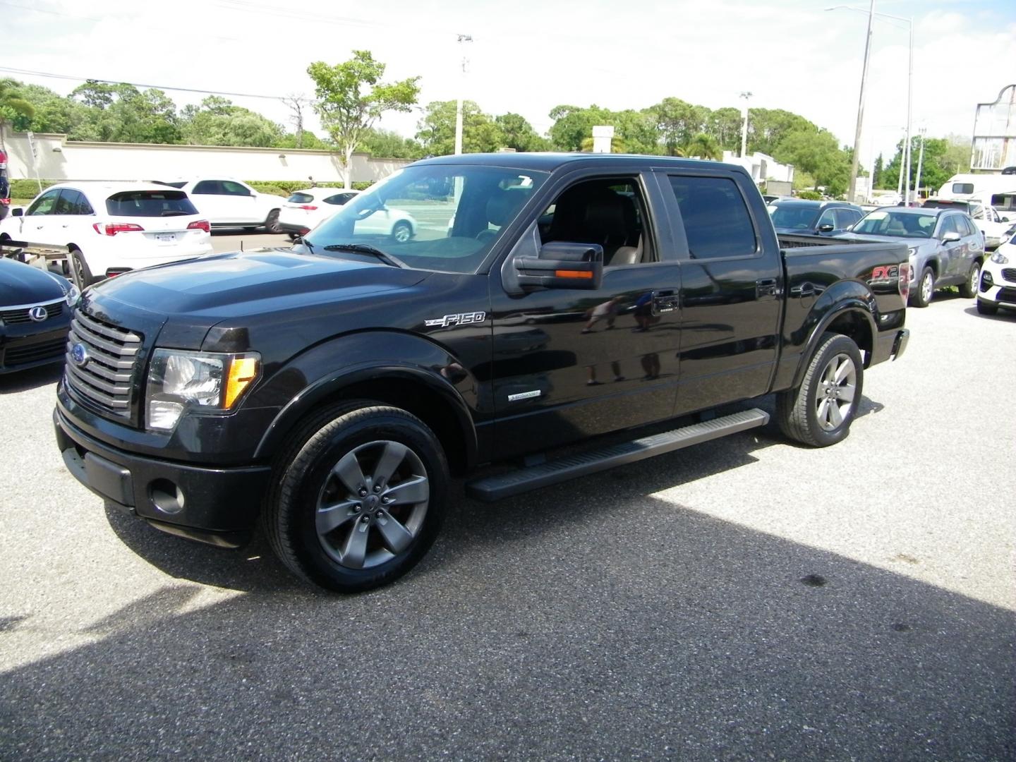 2012 Black /Black Ford F-150 Platinum SuperCrew 6.5-ft. Bed 2WD (1FTFW1CT9CK) with an 3.5L V6 TURBO engine, 6-Speed Automatic transmission, located at 4000 Bee Ridge Road, Sarasota, FL, 34233, (941) 926-0300, 27.298664, -82.489151 - Photo#0